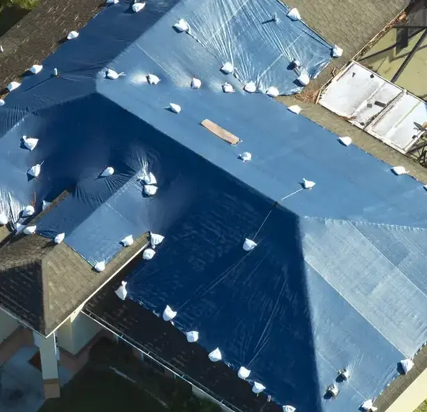 Emergency roof tarping in Dallas, TX by Example City Pros